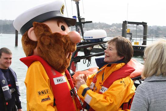 Photo: RNLI mascot Stormy Stan with Celia Imrie