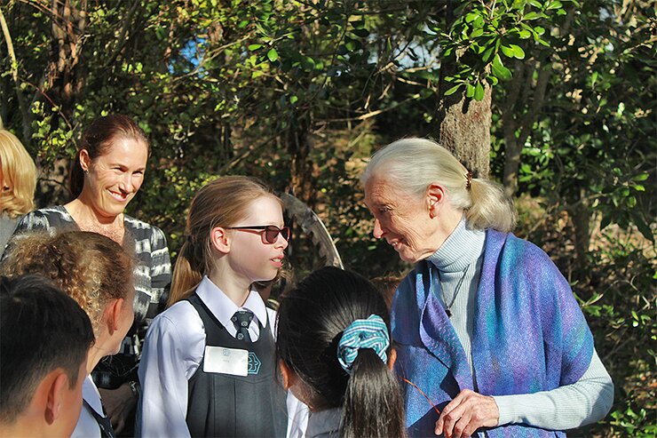 Jane enjoying a chat with a student during the Kristen School Roots & Shoots event