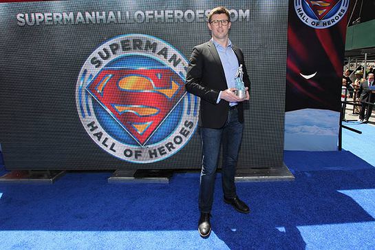 Matthew Reeve, eldest son of Christopher Reeve, accepts the Superman Hall of Heroes award on behalf of his father